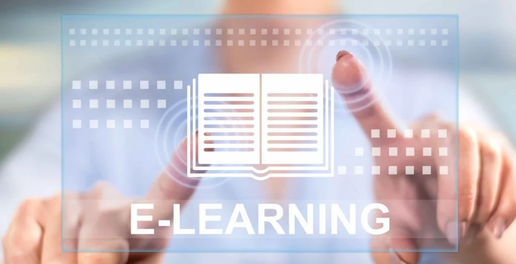 the word elearning on screen with a person trying to engage with it